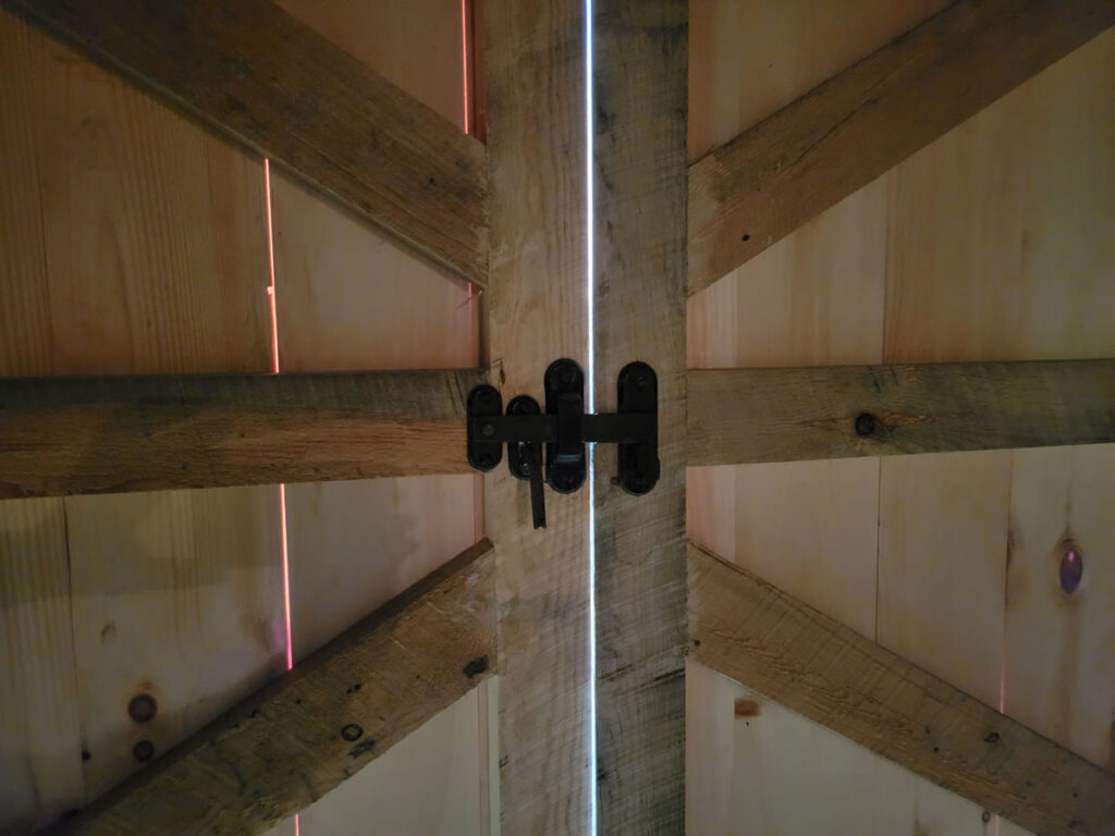 Repaired original swinging barn door hardware